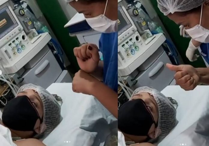 Intérprete de Libras tranquiliza mãe surda durante parto em Goiás